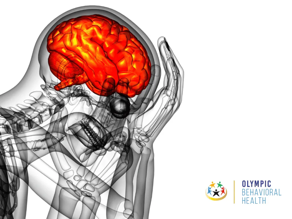 X-ray style skeleton holding its skull with the brain glowing red, illustrating amygdala and positive memory function