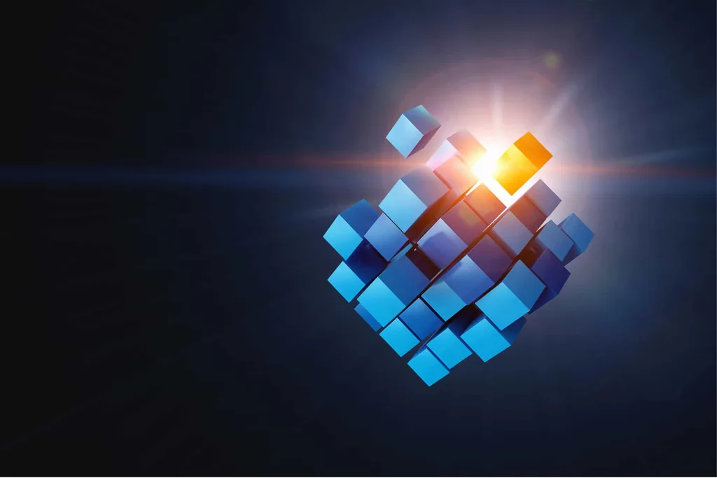 Blue cubes assembling into a glowing shape, illustrating integrating anger management into addiction therapy