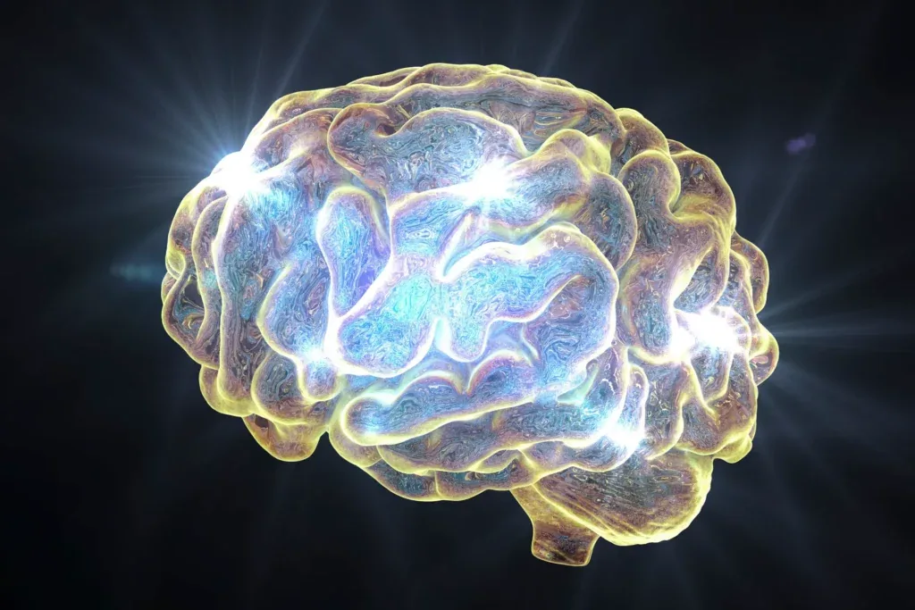 Glowing illustrated human brain with sparkling light, showing how dopamine is produced and secreted in the brain