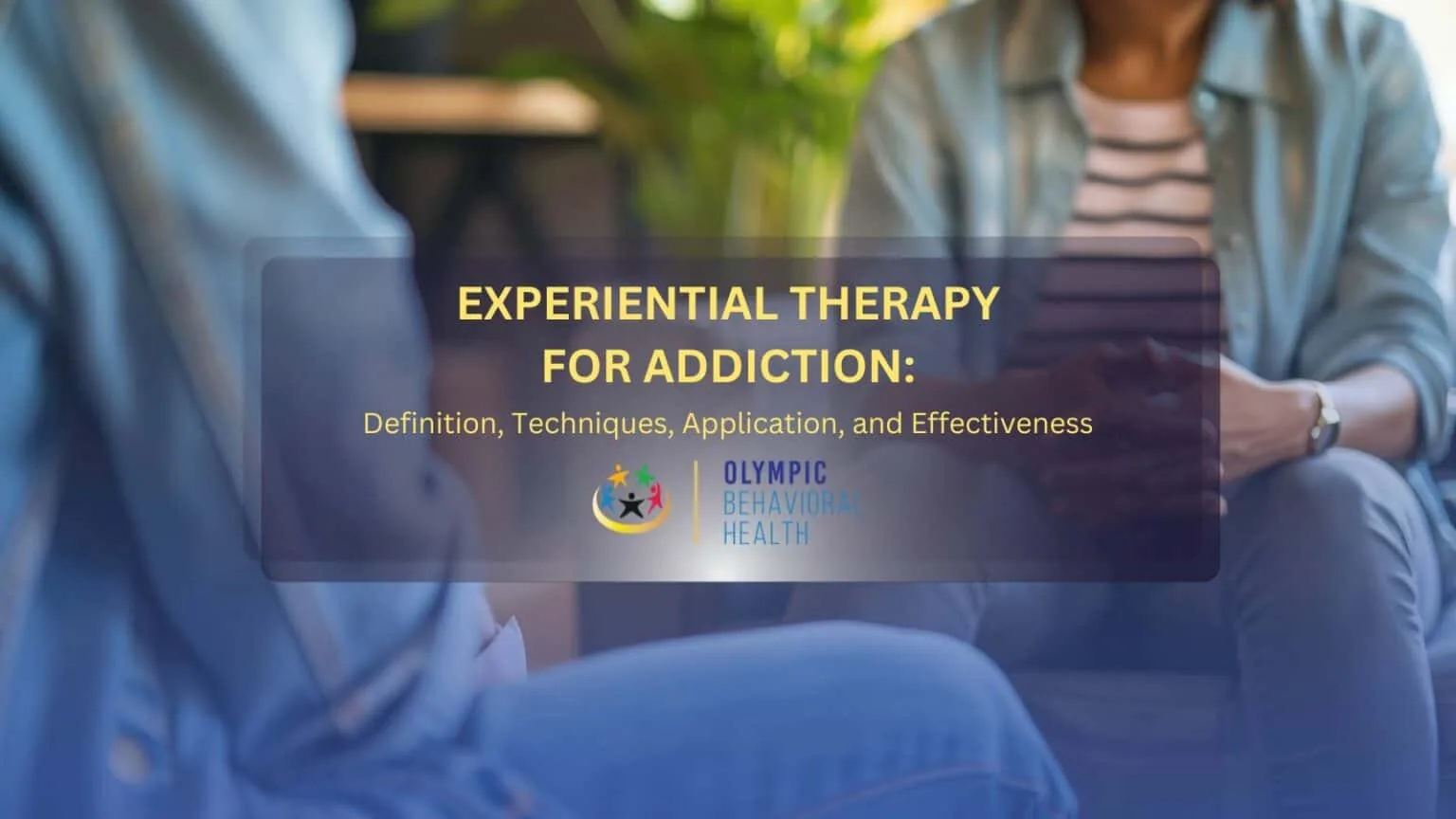 Experiential Therapy for Addiction: Definition, Techniques, Application, and Effectiveness title over a seated person