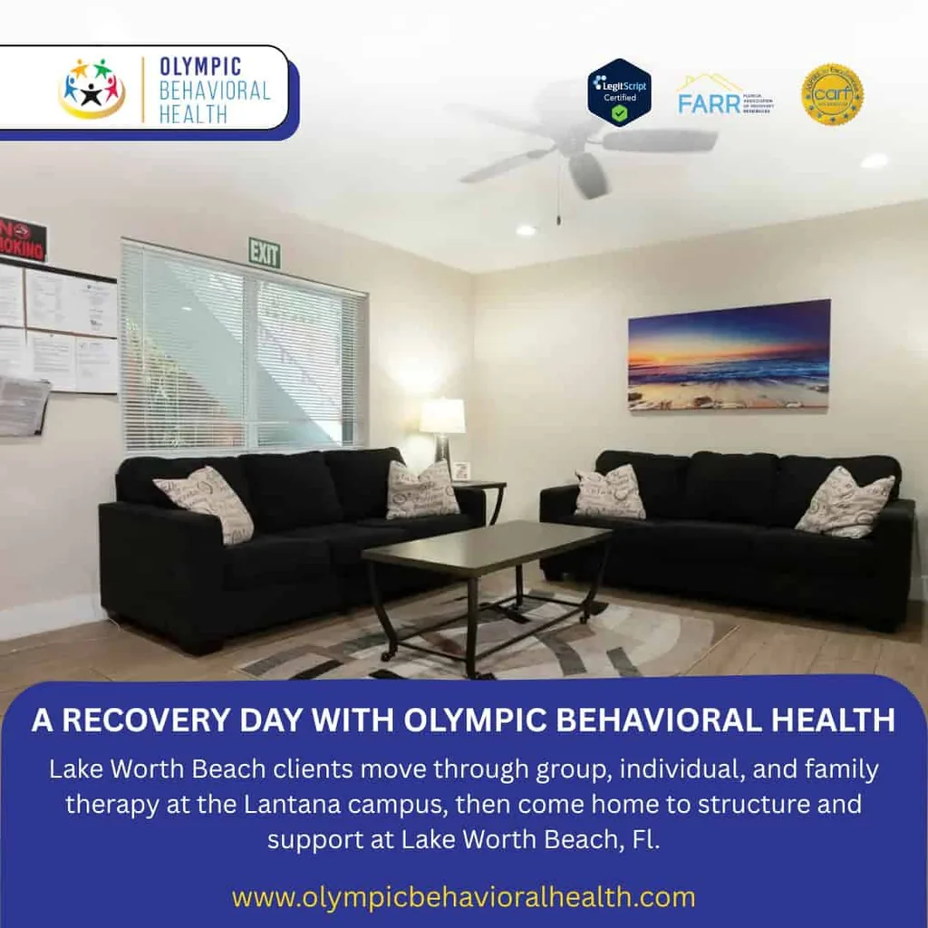 A Recovery Day with Olympic Behavioral Health: common room with black sofas for Lake Worth Beach clients in Lantana therapy