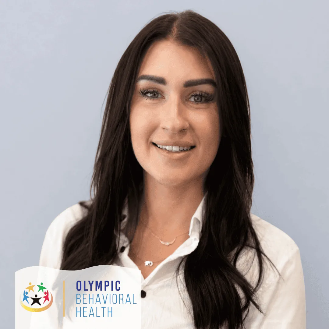 Headshot of Sarah Sabato, Alumni Coordinator at Olympic Behavioral Health, smiling in a white blouse